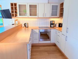 Kuchyň nebo kuchyňský kout v ubytování Wiesen Appartment + 12 fotografií