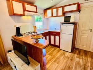 Foto sihtkohas Les Mathes asuva majutusasutuse O'PARADIS - Mobil-home au calme, clim, BBQ & piscine galeriist