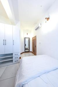 Postel nebo postele na pokoji v ubytování Casa stay + 8 fotografií