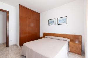Posteľ alebo postele v izbe v ubytovaní Rentalmar Aventura