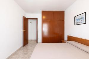 Posteľ alebo postele v izbe v ubytovaní Rentalmar Aventura