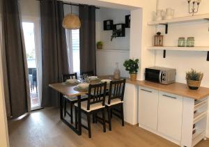 Kuchyň nebo kuchyňský kout v ubytování Apartmani Smiljana