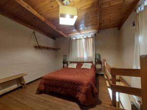 Postel nebo postele na pokoji v ubytování Las Cabañitas