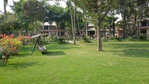 Κήπος έξω από το Hotel Parkland