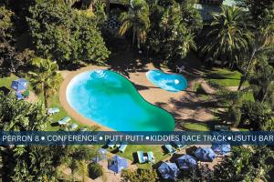 an aerial view of a pool at a resort at Safari Hotel & Convention Centre in Rustenburg