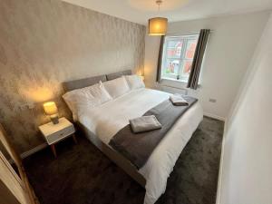 Postel nebo postele na pokoji v ubytování Coral House by Blue Skies Stays + 12 fotografií