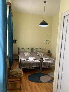 Postel nebo postele na pokoji v ubytování Nana's Home