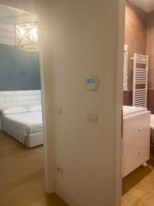 Кровать или кровати в номере Abitare al 42