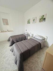 Postel nebo postele na pokoji v ubytování Podere 48 - Relax tra mare e natura a Sabaudia - fino a 5 persone
