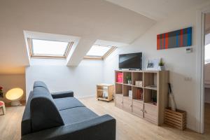 TV a/nebo společenská místnost v ubytování Como City Center Apartments!
