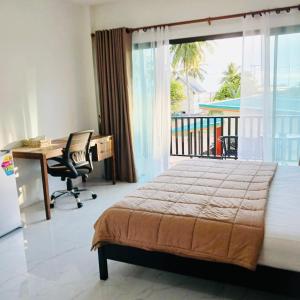 Ένα ή περισσότερα κρεβάτια σε δωμάτιο στο First Light sunset view bungalow