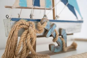 a close up of a rope hanging from a boat at Catania Over Time - Tourist Rooms in Catania