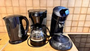 a coffee maker and a blender on a counter at Waldtwin 2 Titisee (W12) + Hochschwarzwald Card in Titisee-Neustadt +21 photos