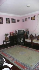 TV o dispositivi per l'intrattenimento presso Nagarjun Home Stay
