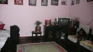 TV o dispositivi per l'intrattenimento presso Nagarjun Home Stay