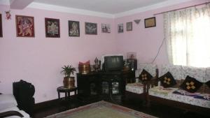 TV o dispositivi per l'intrattenimento presso Nagarjun Home Stay