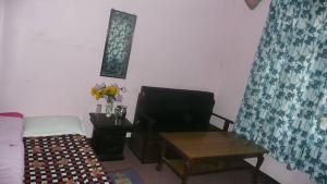 Area soggiorno di Nagarjun Home Stay