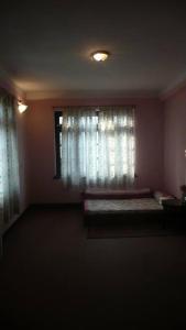 Letto o letti in una camera di Nagarjun Home Stay