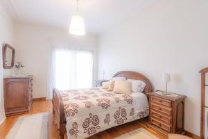 Postel nebo postele na pokoji v ubytování Quinta dos Arcos + 4 fotografie