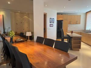 A kitchen or kitchenette at Bright beachfront retreat in Bang Tao