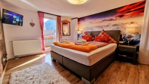 TV a/nebo společenská místnost v ubytování Breitenberg - 2,5-Zimmer Apartment mit Südbalkon und traumhaftem Bergblick ruhig gelegen in Pfronten Mitte