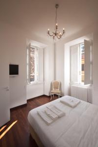Кровать или кровати в номере Imperia Suite