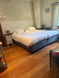 Postel nebo postele na pokoji v ubytování Hotel In't Boldershof