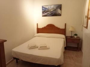 Postel nebo postele na pokoji v ubytování Apartamentos Valle de Tena - Biescas 3000 + 37 fotografií