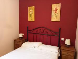 Postel nebo postele na pokoji v ubytování Apartamentos Valle de Tena - Biescas 3000