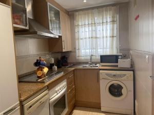 Kuchyň nebo kuchyňský kout v ubytování Apartamentos Marina Park