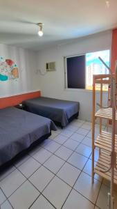Postel nebo postele na pokoji v ubytování Caldas Novas Apartamento Parque Aquatico Excelente + 50 fotografií