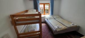 Postel nebo postele na pokoji v ubytování Mahala Apartments - Free Garage