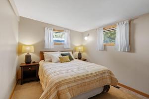 Ένα ή περισσότερα κρεβάτια σε δωμάτιο στο Lake Pulaski Getaway