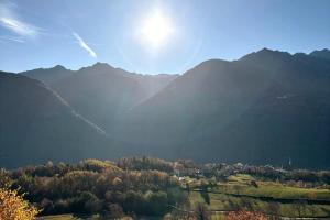a view of a valley with mountains in the background at Casa Theresia in Teglio