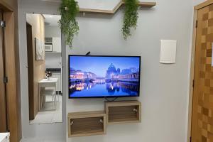 TV a/nebo společenská místnost v ubytování 402 Flat Agradavel e Acolhedor