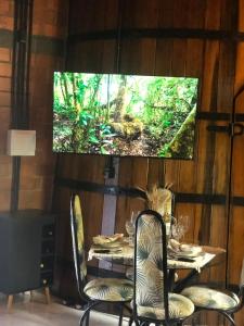 TV a/nebo společenská místnost v ubytování Casa di Pipa com ofurô