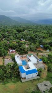 an overhead view of a building in a field at Hotel Villa catalina in Hato Viejo