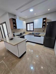 Køkken eller tekøkken på Luxueux Appartement pieds dans l'eau