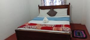 Letto o letti in una camera di Stay Logi Nanuoya