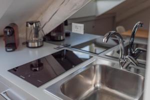 Kuchyň nebo kuchyňský kout v ubytování Suites Beethoven & Vivaldi by Toh Solution