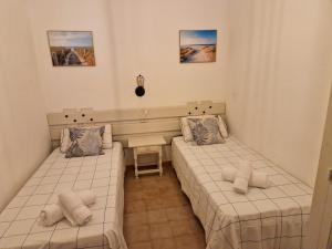 Ένα ή περισσότερα κρεβάτια σε δωμάτιο στο Casita 12
