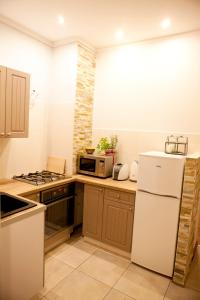 Kuchyňa alebo kuchynka v ubytovaní Apartament Bukowe Wzgórze
