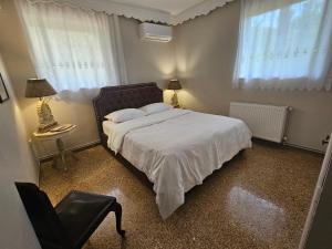 Postel nebo postele na pokoji v ubytování Tilfousa's Home + 8 fotografií