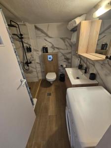Kuchyň nebo kuchyňský kout v ubytování Tilfousa's Home