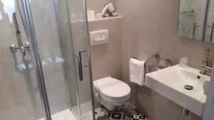 Koupelna v ubytování Régina Boutique Hotel