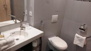 Koupelna v ubytování Régina Boutique Hotel
