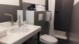 Koupelna v ubytování Régina Boutique Hotel
