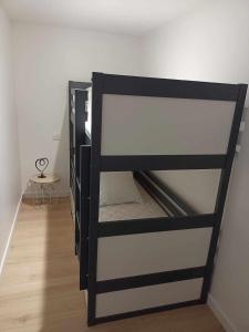 Ένα ή περισσότερα κρεβάτια σε δωμάτιο στο Appartement, en bord du GR34