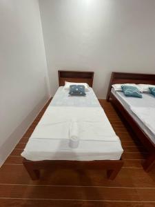 Ένα ή περισσότερα κρεβάτια σε δωμάτιο στο L&G Tourists Inn +3 φωτογραφίες