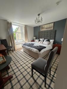 Ένα ή περισσότερα κρεβάτια σε δωμάτιο στο Ratcliffe Room